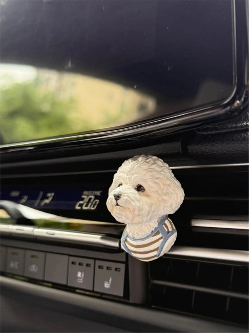 Custom handmade dog magnet created from a pet photo and displayed on a car air vent